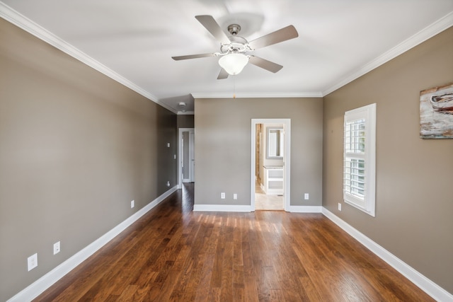 unfurnished room featuring ceiling fan, dark hardwood / wood-style flooring, and ornamental molding