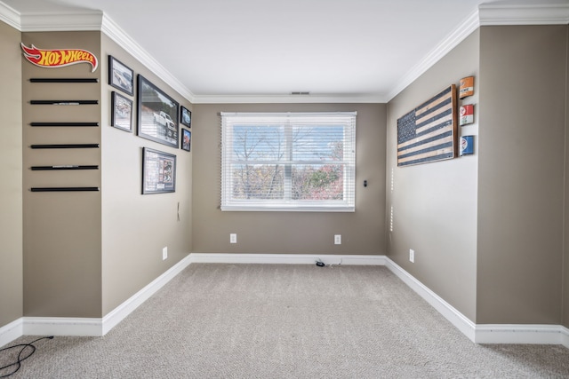 unfurnished room with carpet and ornamental molding