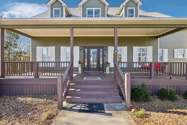 property entrance with covered porch