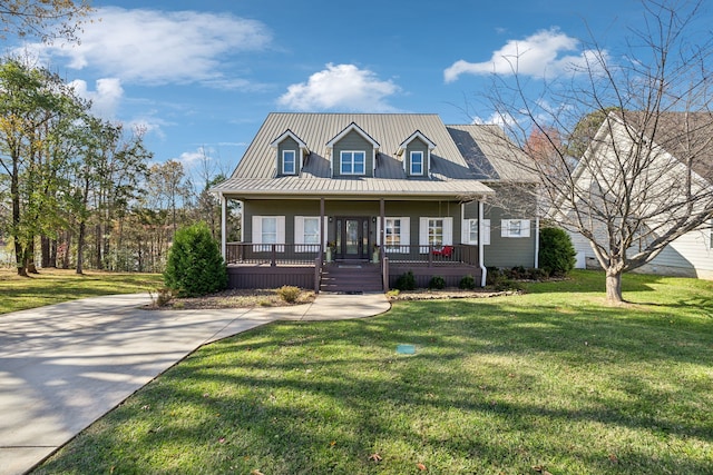 view of front of house featuring covered porch and a front lawn