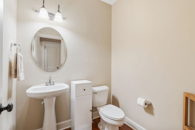 bathroom featuring toilet