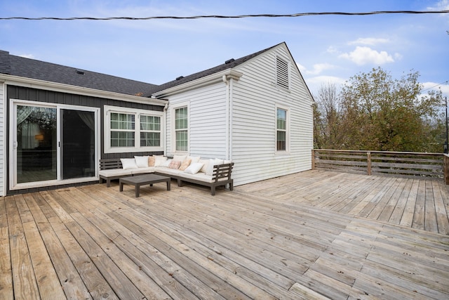 wooden terrace with outdoor lounge area