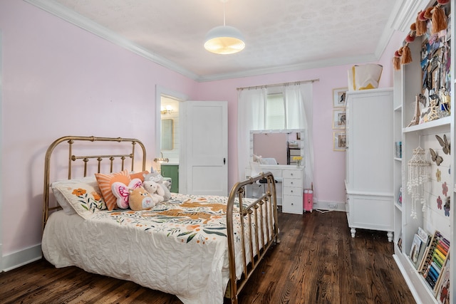 bedroom featuring dark hardwood / wood-style floors, ornamental molding, and a textured ceiling