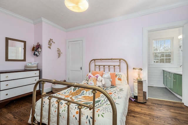 bedroom with crown molding and dark hardwood / wood-style floors