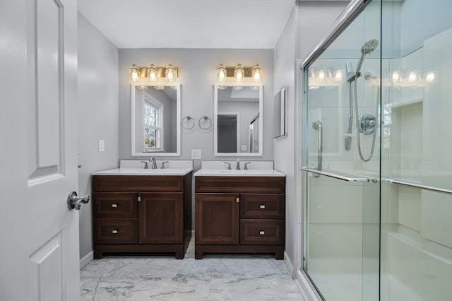 bathroom with vanity and an enclosed shower