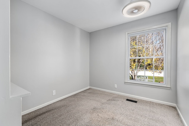 view of carpeted spare room