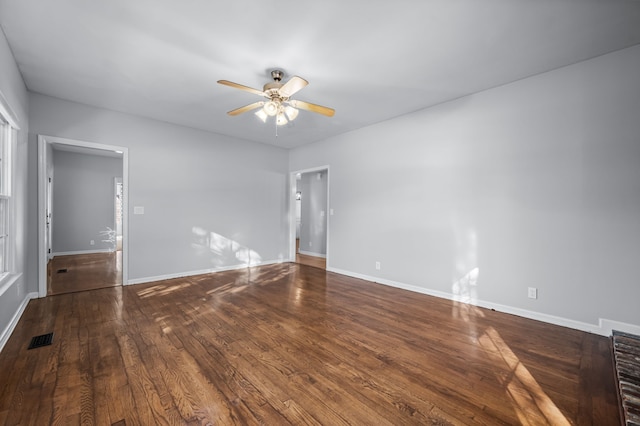 unfurnished room featuring hardwood / wood-style flooring and ceiling fan