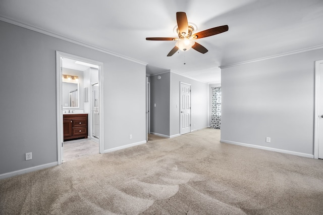 carpeted empty room featuring ceiling fan and ornamental molding