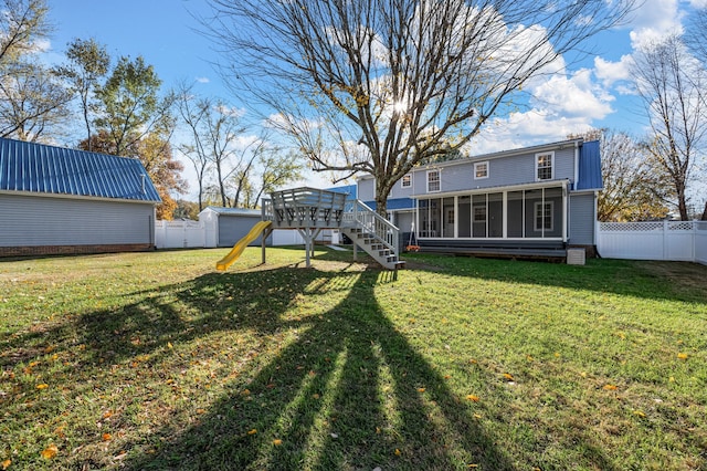 view of yard with a sunroom