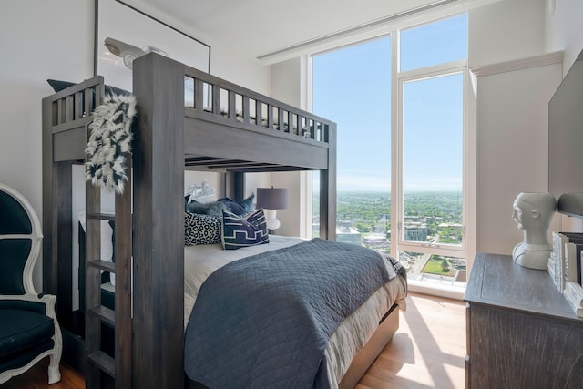 bedroom with light wood-type flooring