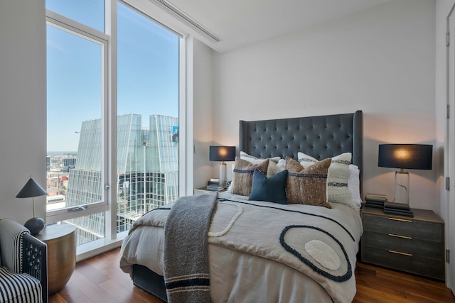 bedroom featuring dark hardwood / wood-style floors