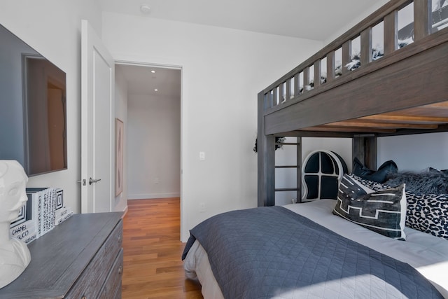 bedroom featuring hardwood / wood-style floors