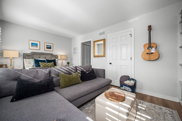 bedroom with hardwood / wood-style flooring