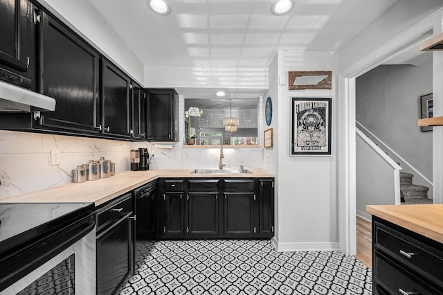 kitchen with tasteful backsplash, sink, light hardwood / wood-style flooring, black dishwasher, and stainless steel electric range