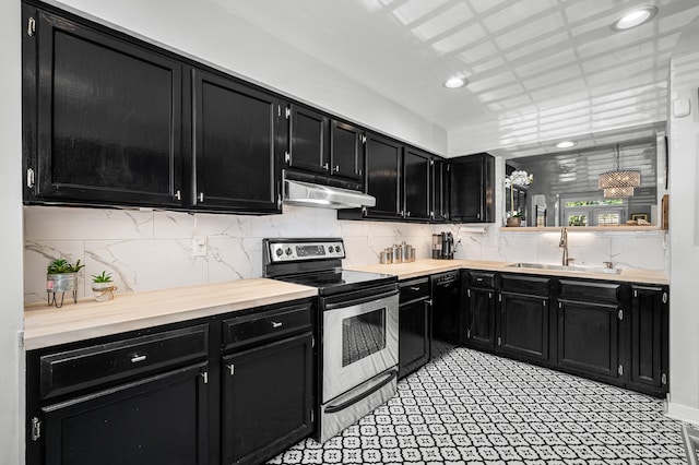 kitchen with backsplash, stainless steel electric stove, and sink