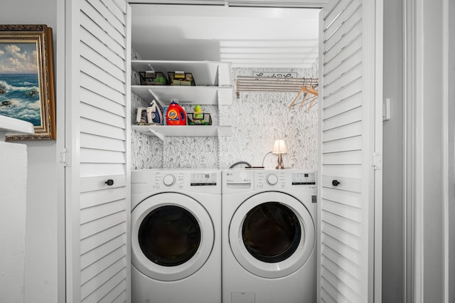 laundry area with separate washer and dryer