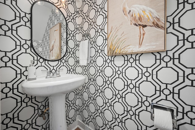 bathroom featuring backsplash and tile walls