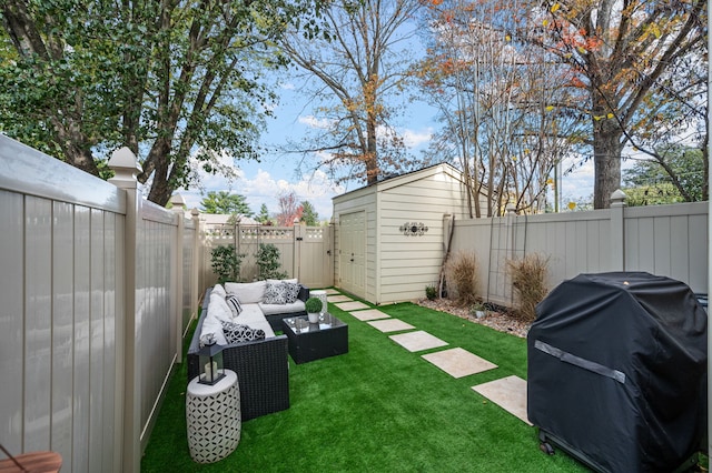 view of yard with a storage unit and an outdoor hangout area