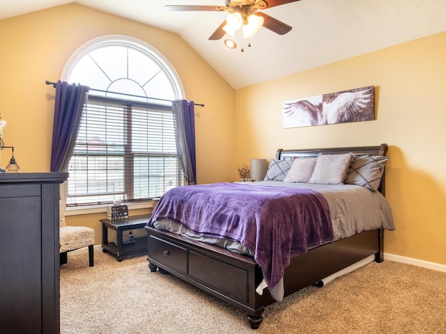 carpeted bedroom featuring ceiling fan and lofted ceiling