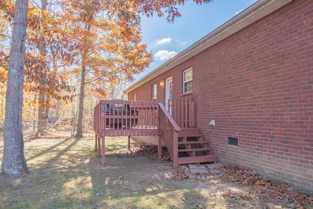 view of yard with a wooden deck