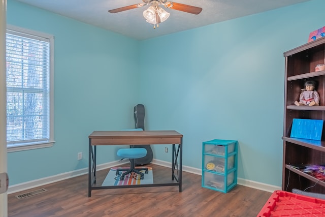 office featuring ceiling fan and dark hardwood / wood-style flooring