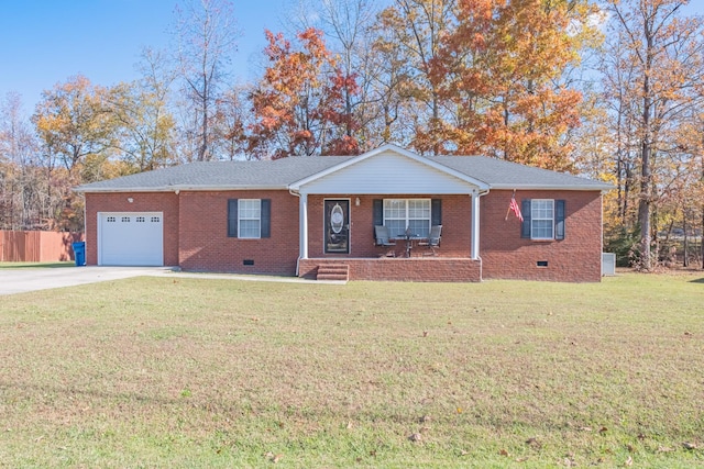353 Oak Hollow Rd, Manchester, TN 37355 - ranch-style house featuring an attached garage, covered porch, driveway, brick siding, and crawl space