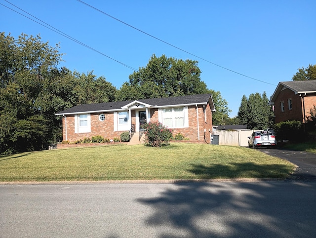 view of front facade with a front yard