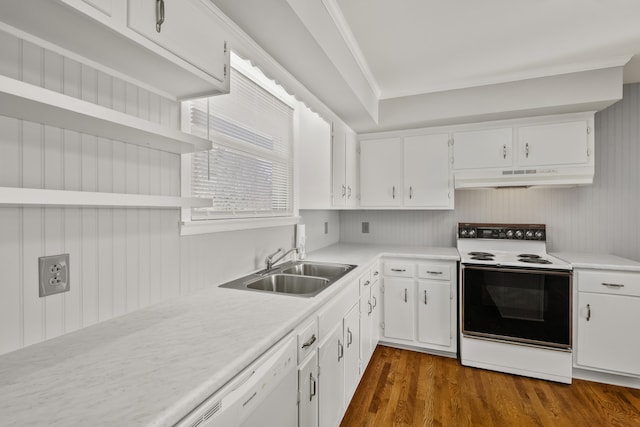 kitchen with white cabinets, white appliances, dark hardwood / wood-style floors, and sink