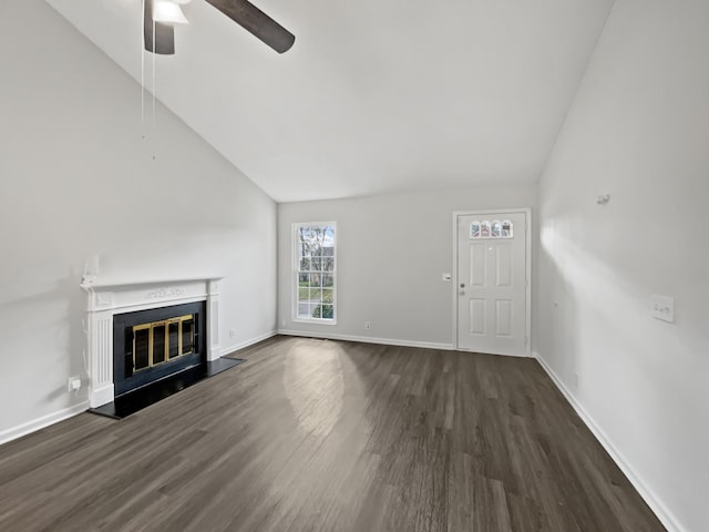 unfurnished living room with ceiling fan, dark hardwood / wood-style floors, and lofted ceiling