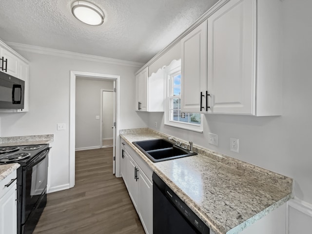 kitchen with black appliances, dark hardwood / wood-style floors, and white cabinets