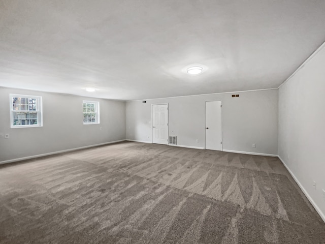 spare room featuring carpet flooring