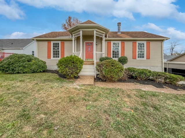 view of front of house with a front lawn