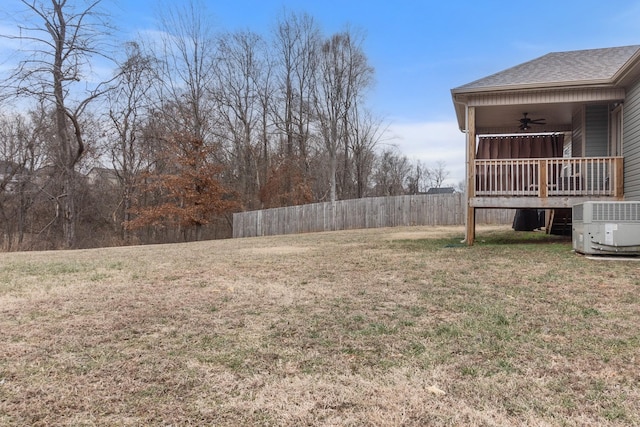 view of yard with cooling unit and ceiling fan