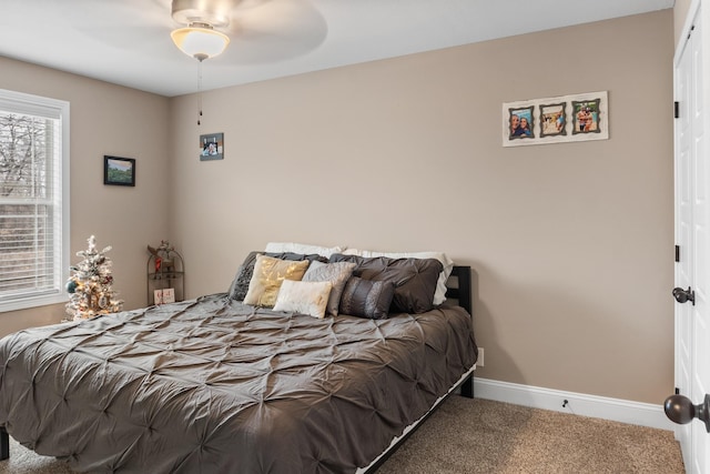 bedroom featuring ceiling fan and carpet flooring