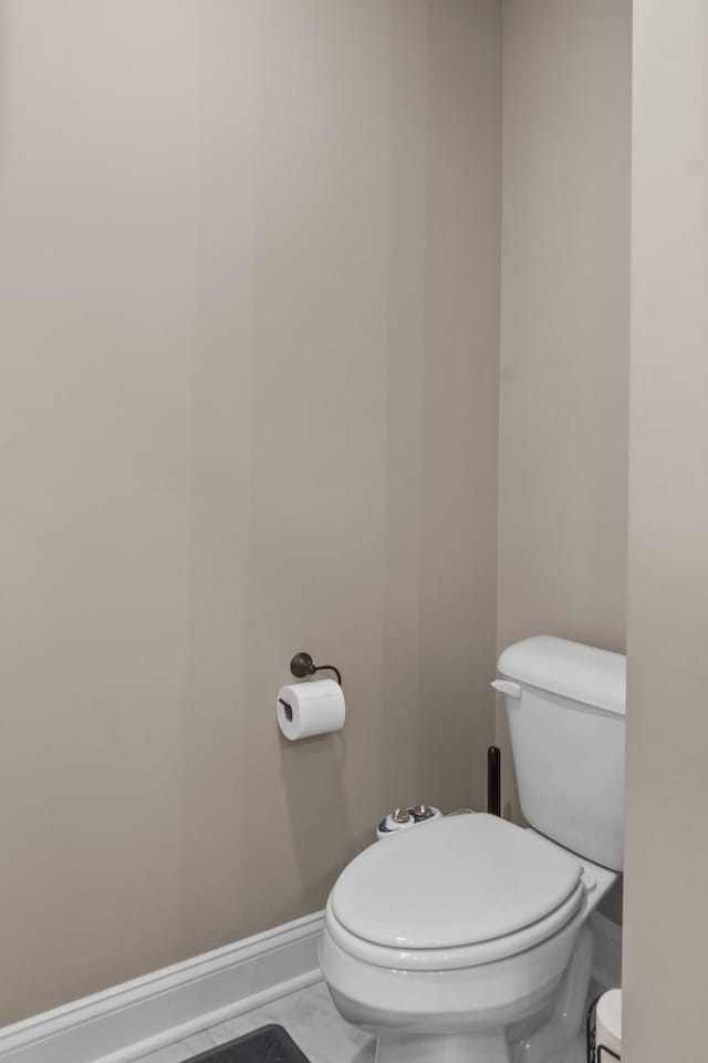 bathroom featuring toilet