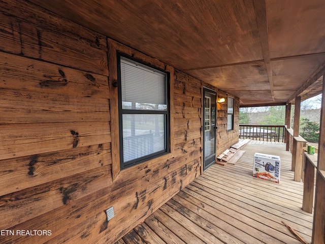 wooden deck featuring a porch