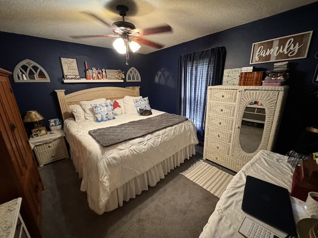 bedroom with carpet, a textured ceiling, and ceiling fan