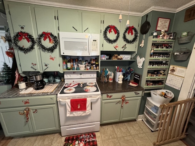 kitchen featuring a textured ceiling, white appliances, green cabinetry, and ornamental molding