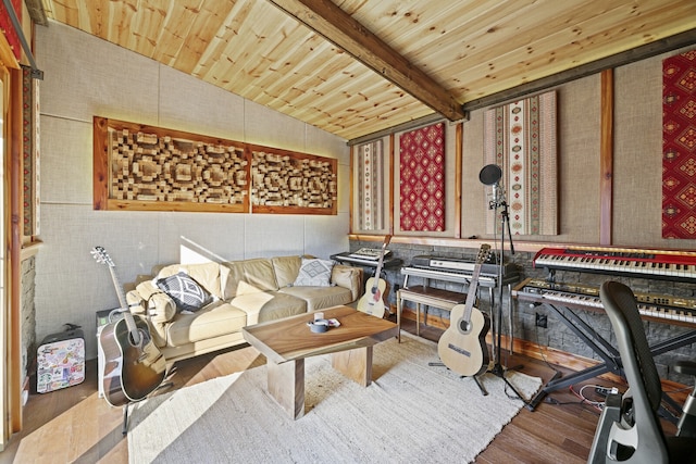 living room featuring hardwood / wood-style flooring, lofted ceiling with beams, and wooden ceiling