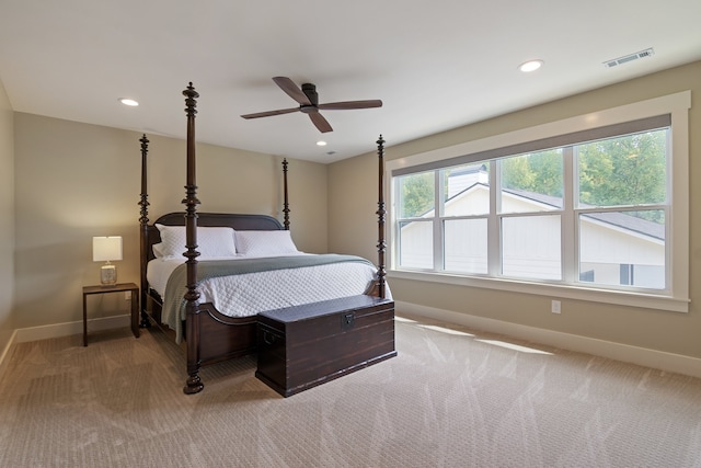 carpeted bedroom featuring ceiling fan