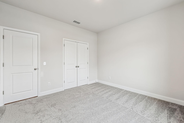 unfurnished bedroom featuring carpet flooring