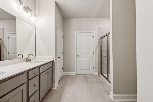 bathroom with vanity and walk in shower