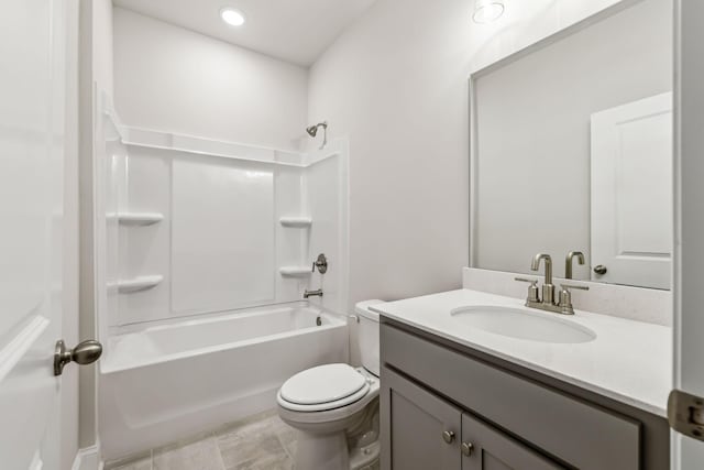 full bathroom with bathtub / shower combination, vanity, and toilet