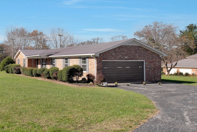 ranch-style house with a front yard and a garage