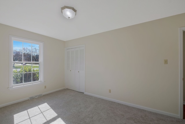 interior space with light colored carpet