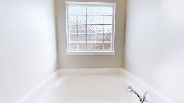 bathroom with a bathing tub