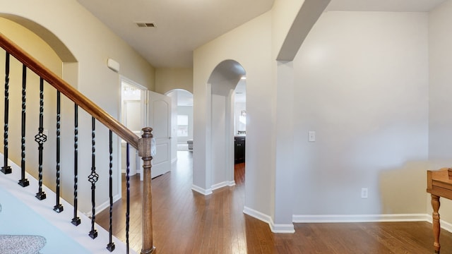 foyer with dark wood-type flooring