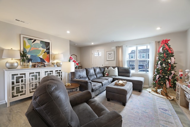 living room with light hardwood / wood-style flooring