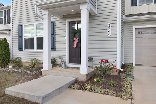 property entrance featuring a garage