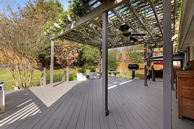 wooden deck featuring a pergola